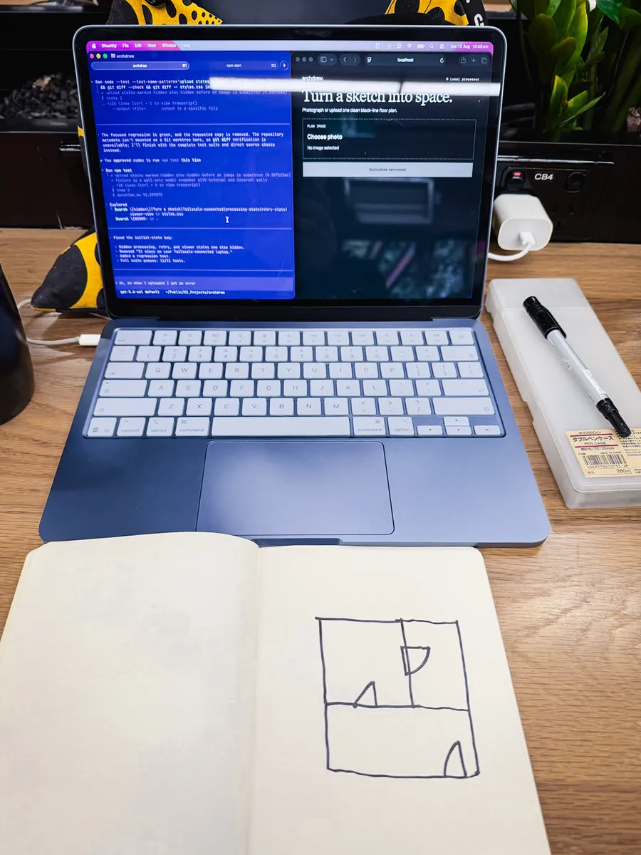 The morning’s desk, a laptop with Codex in the terminal beside the app’s first screen, and in front of it a notebook open on a hand drawn floor plan.